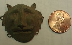 Lion head trade broach.jpg