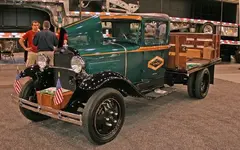 163_0906_2009_gwts_01z+1931_ford_model_aa_stake_bed_truck+front_view.webp