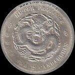 chinese_silver_dragon_dollar_coin.jpg