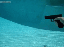 1351183525_slowmotion_underwater_gunshot__glock_22.gif