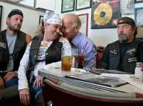 Biden-biker-woman-AP.webp