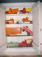 toy_trucks_in_cabinet.JPG