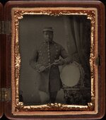 Three_quarter_length_portrait,_soldier_with_bass_drum,_holding_sticks._Cased_tintype,_gutta_perc.jpg