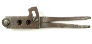 bulletmold_44ColtPatent_1850s_with-sprue-cutter_topview_TN_postedbyBosnMate.jpg