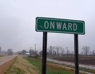 onward-town-sign.webp