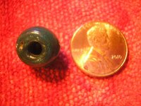 17th Century Dutch glass trade bead (with  penny for scale).JPG