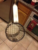 Sand scoop back of basket with foot plate.jpg