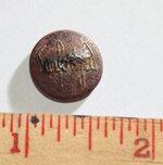 Sanforized button with ruler.jpg