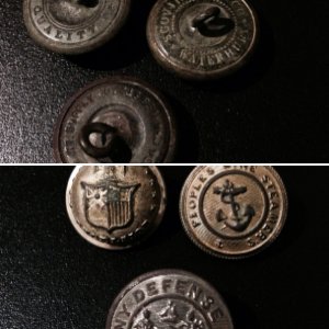 Three old buttons...