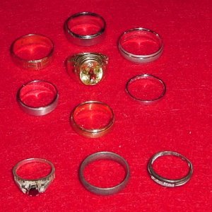 RINGS FROM JAMAICA TRIP - FOUND 20 - 18 SHOWN 
(1 RETURNED - 1 STOLEN THAT ARE MISSING FROM PIC)