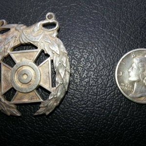 Sterling WWII expert marksman medal.