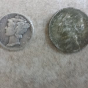 20150610 202708  Old VFW Notable coins.  1936 Merc and a 1943-P War Nickle