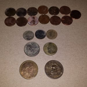 20151203 Total found at Liberty Park in Madison with the GoFind 60. Included are my first Sacagawea dollar and my first Presidential dollar.