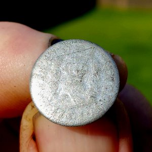 1761 Spanish Half Real coin that was made into a cufflink