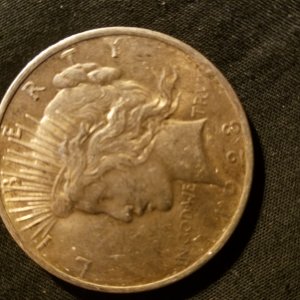 Guy in front of me paid for his coffee with this and I wasted no time buying it from the cashier....1928 Philadelphia key date peace dollar