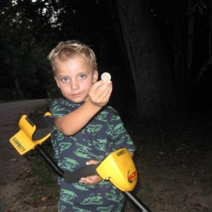 Little Dude - My little guy and his first coin. (A quarter) Proud Pops -