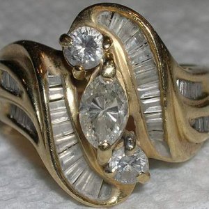 Woman's Diamond Ring - Woman's 14k diamond ring. It has a total of 47 diamonds!