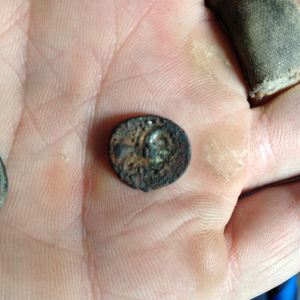 Silver Celtic coin covered in iron, iceni horse and boar