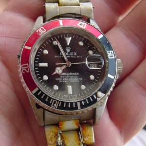 FAKE ROLEX FOUND AT OUTH BCH FLA. - 1ST CLUE IT'S FAKE = DATE MAGNIFIER - DOES NOT MAGNIFY