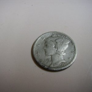 1917 Mercury Dime (Winged Liberty) Found in Vacant lot, same lot as the Potts token.