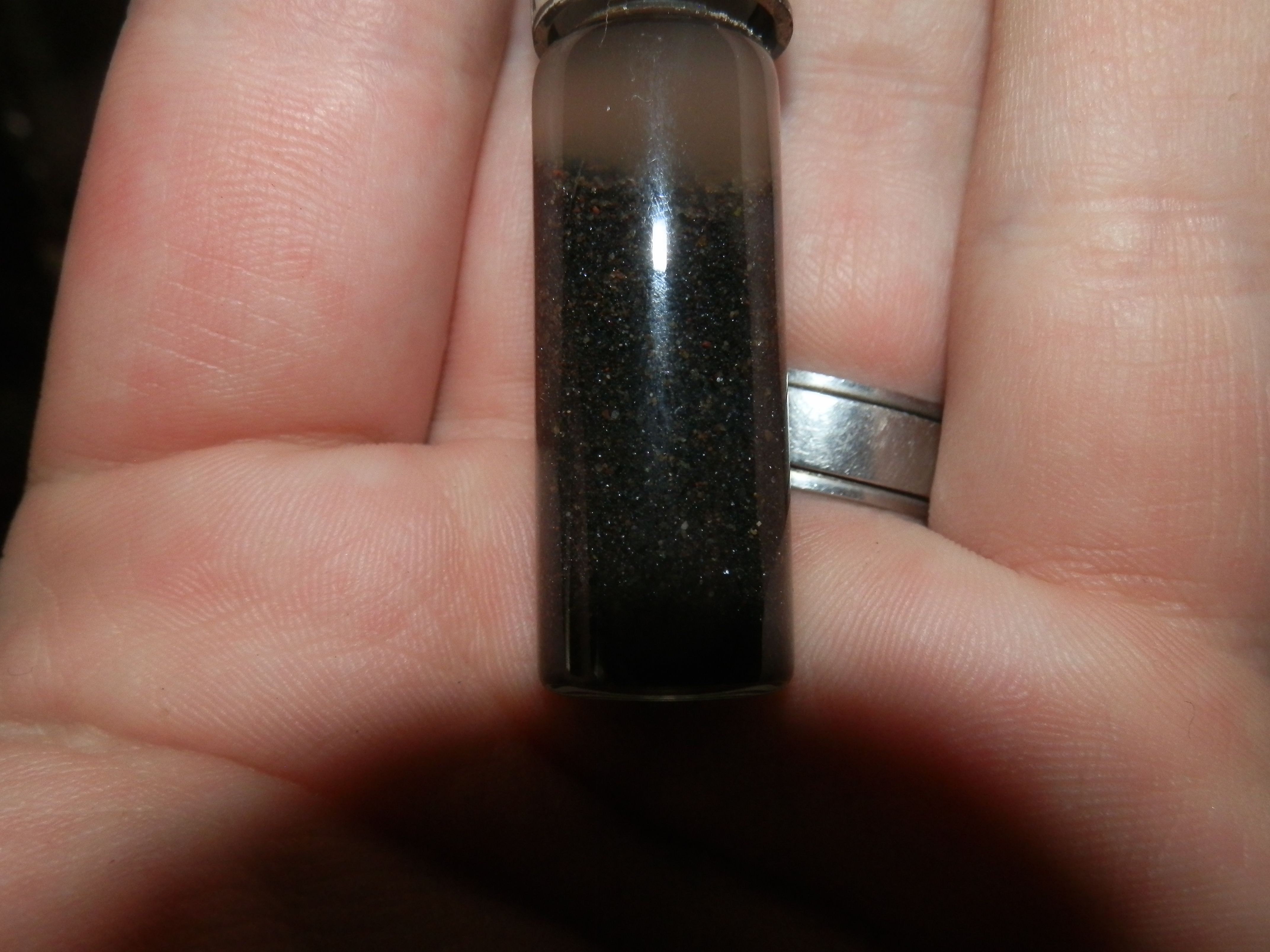 1 oz vial of black sand