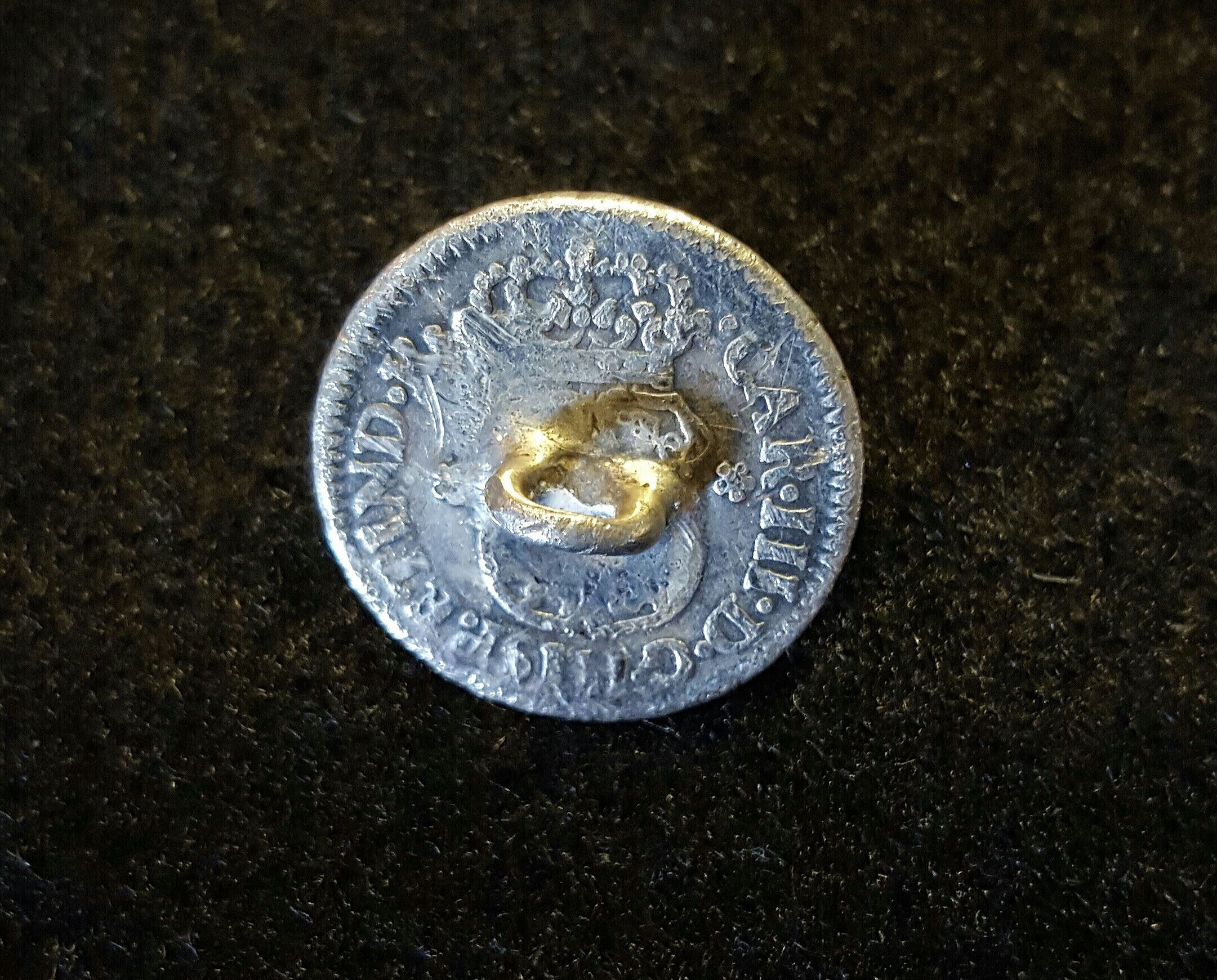 1761 Spanish Half Real coin that was made into a cufflink