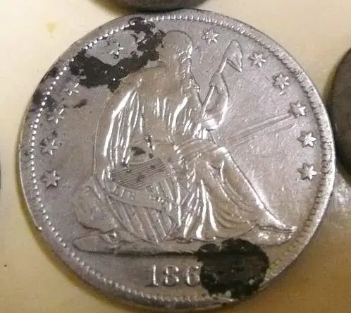 1865 Seated Half Dollar - I found this Coin/Token April 30, 2010 at a One Room School house site, the school no longer stands and I found it in a corn