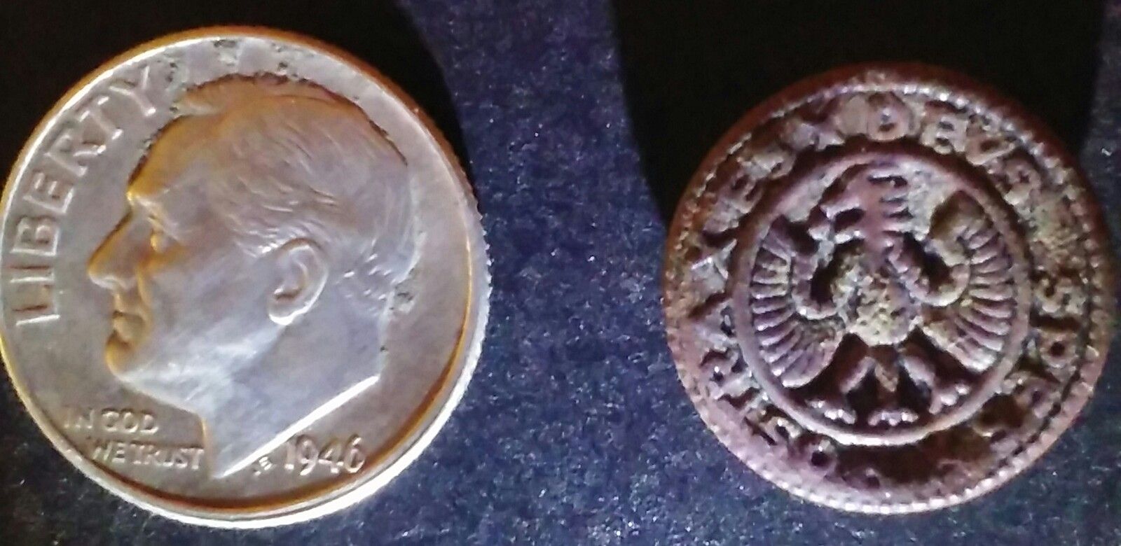 1900s "re-pop" of a 1775 (revolutionary war) hessian british soldier uniform button.... a 3 legged teutonic eagle and in latin it says "Nostra es devs