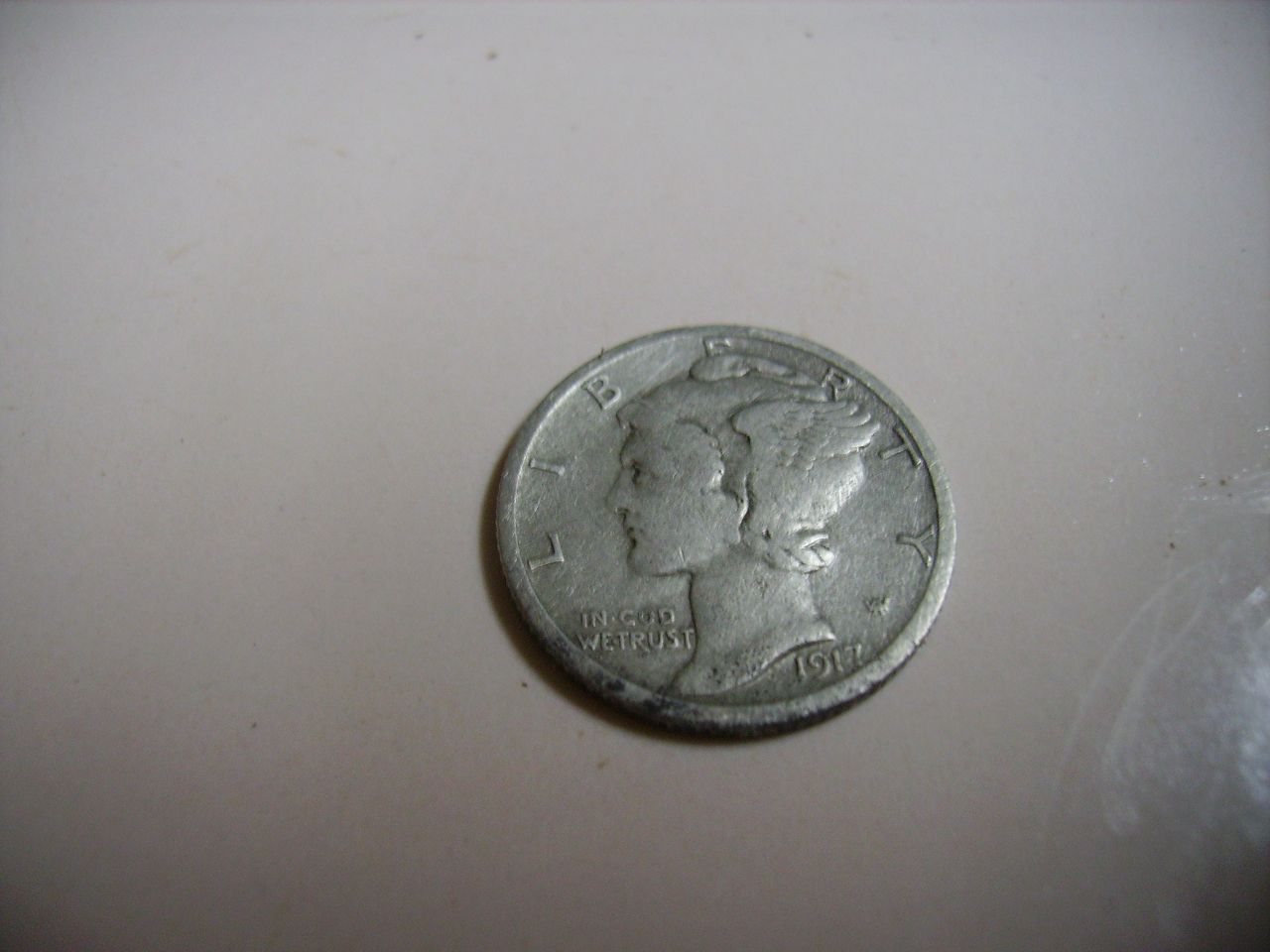 1917 Mercury Dime (Winged Liberty) Found in Vacant lot, same lot as the Potts token.