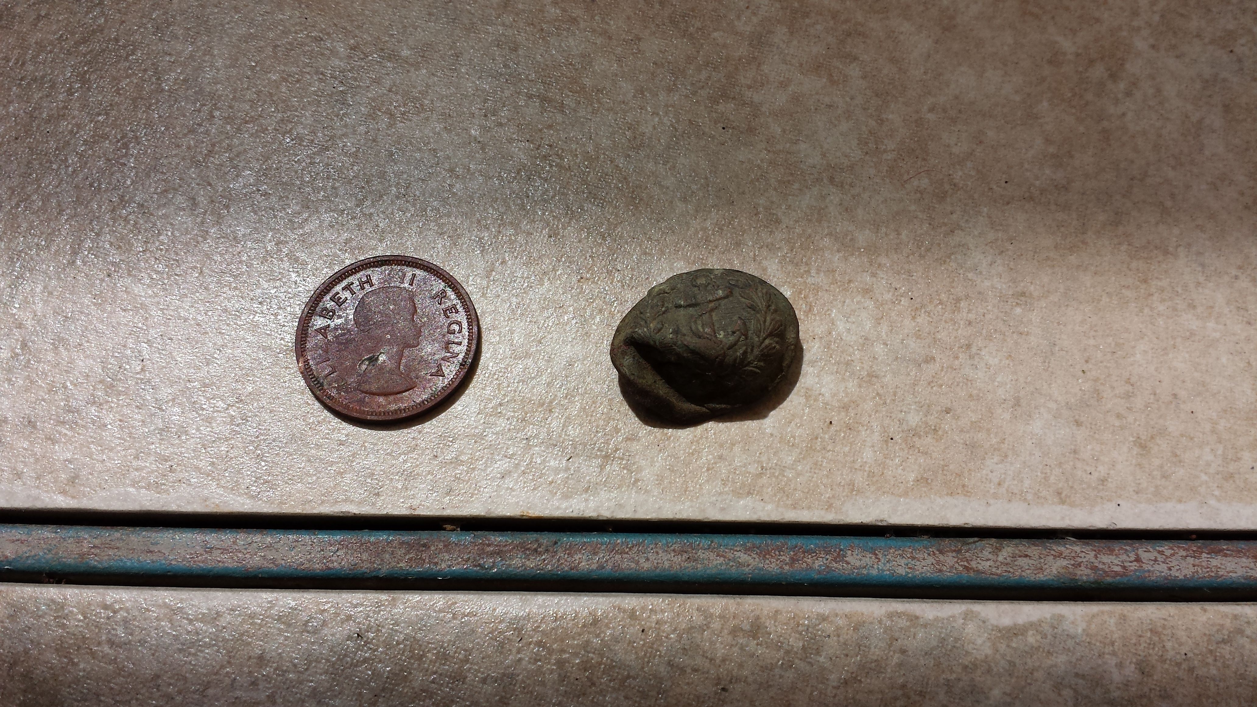 20150621 153016  Farthing from the old VFW and a button from the grey house