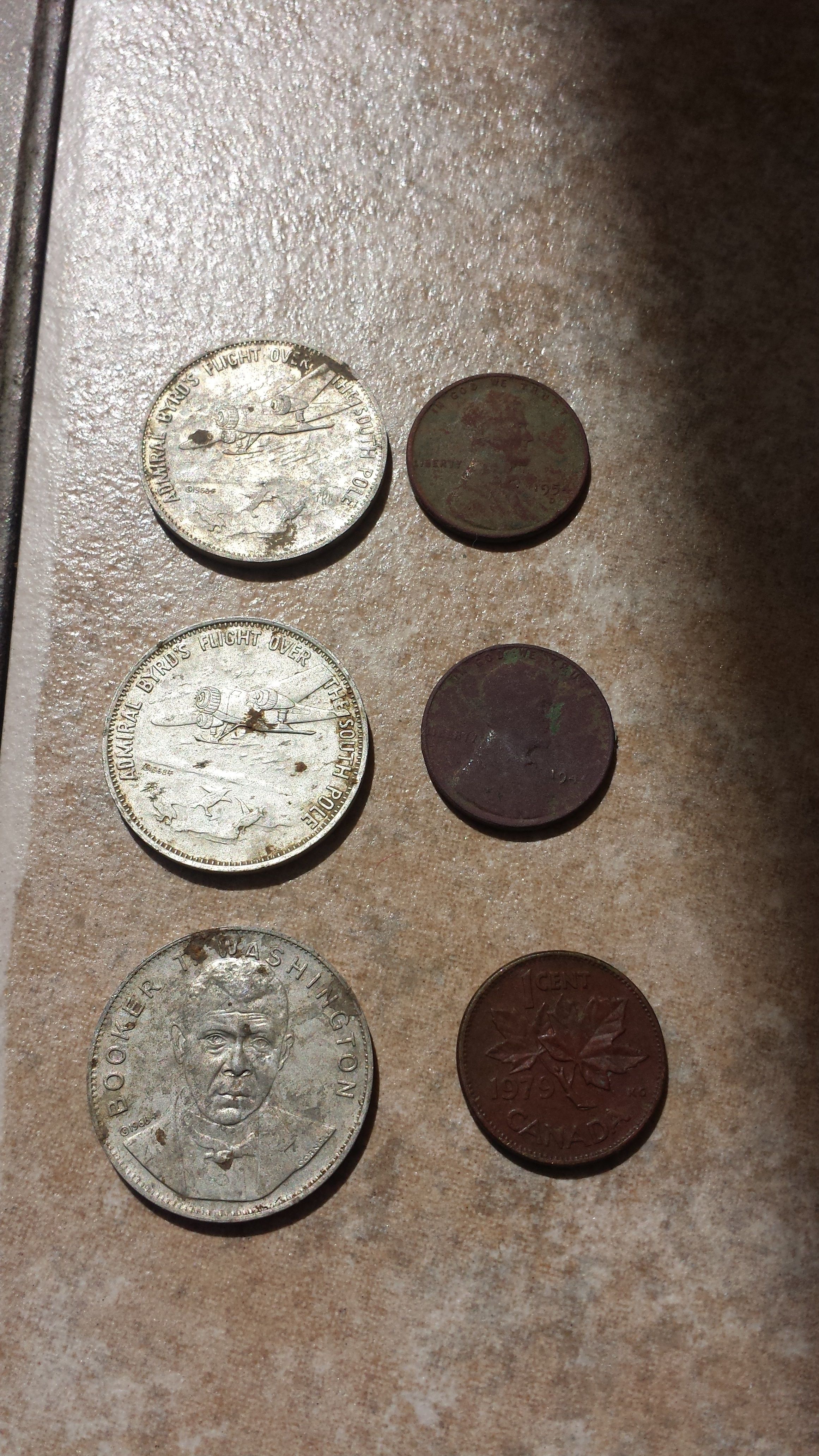 20150718 160932  House by Catholic church Noatables.  3 Shell Oil Co tokens, 2 wheats 1946 & 1954-D