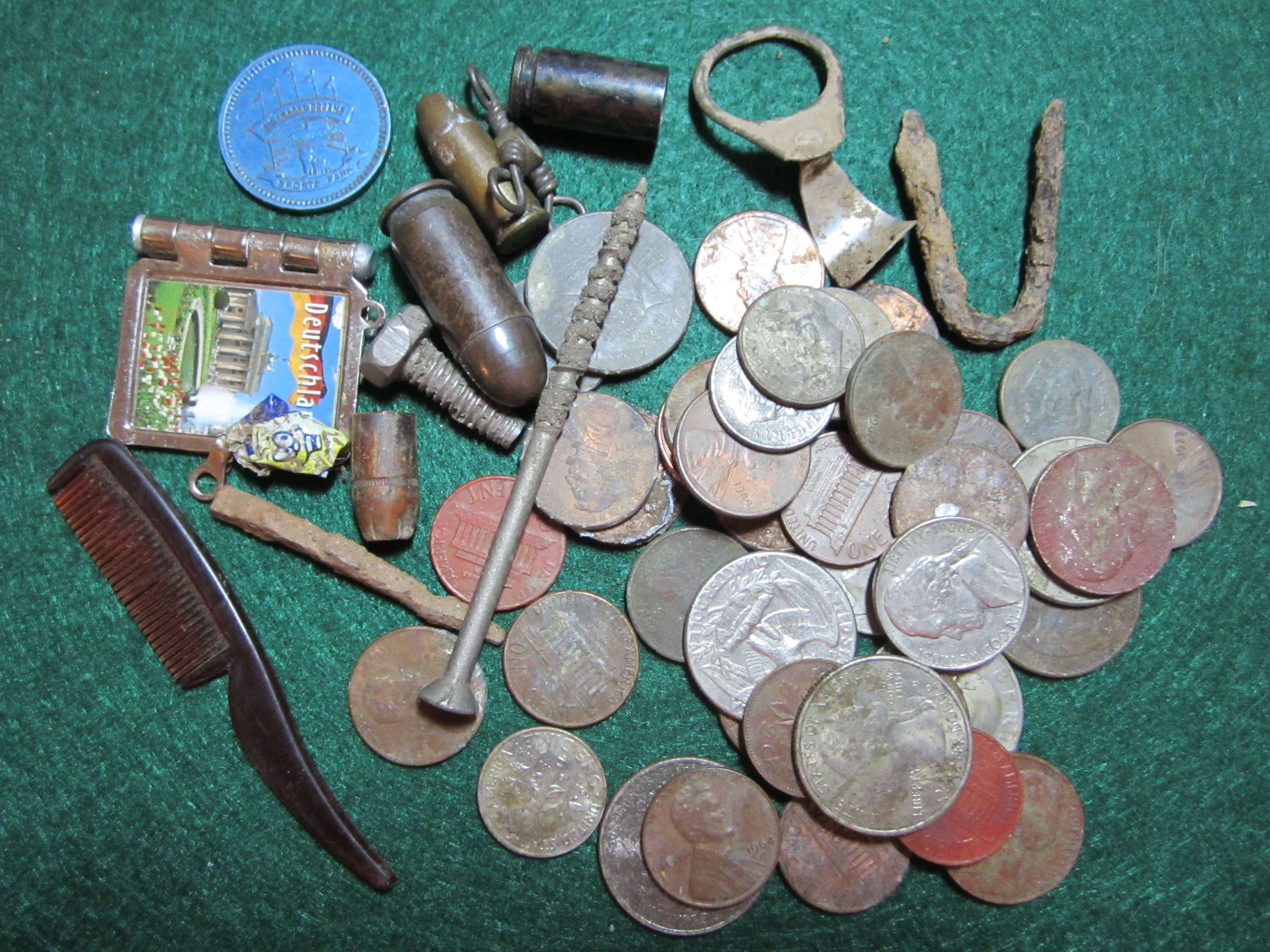 Accumulated stuff I found since starting my new metal detecting hobby. Of course I have found a huge amount of pull tabs, foil and bottle tops. The tr