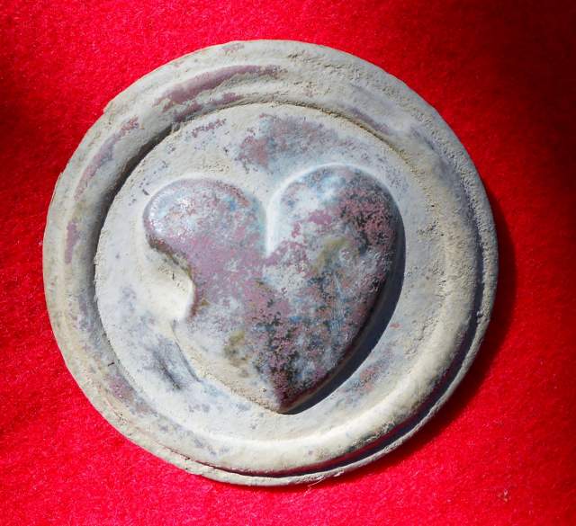 Brass Heart Rosette -         Dug this one near the Hartsville Battle area on 10-25-11 while hunting with Dman. Ironically, I dug a plain brass rectan