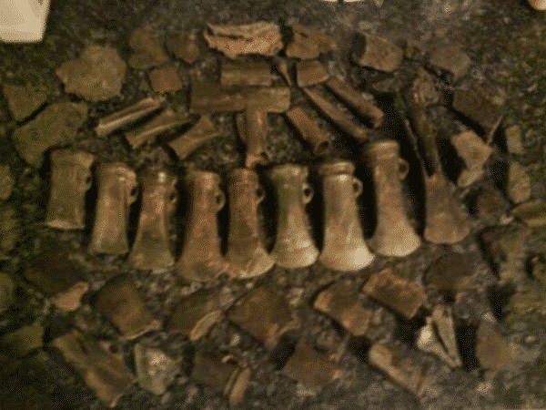 Bronze age axe hoard also included chisels, gouges, a hammer and broken pieces of spear heads and sword blades