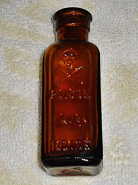 Brougham Hotel Site - Skull & Crossbones Poison Bottle