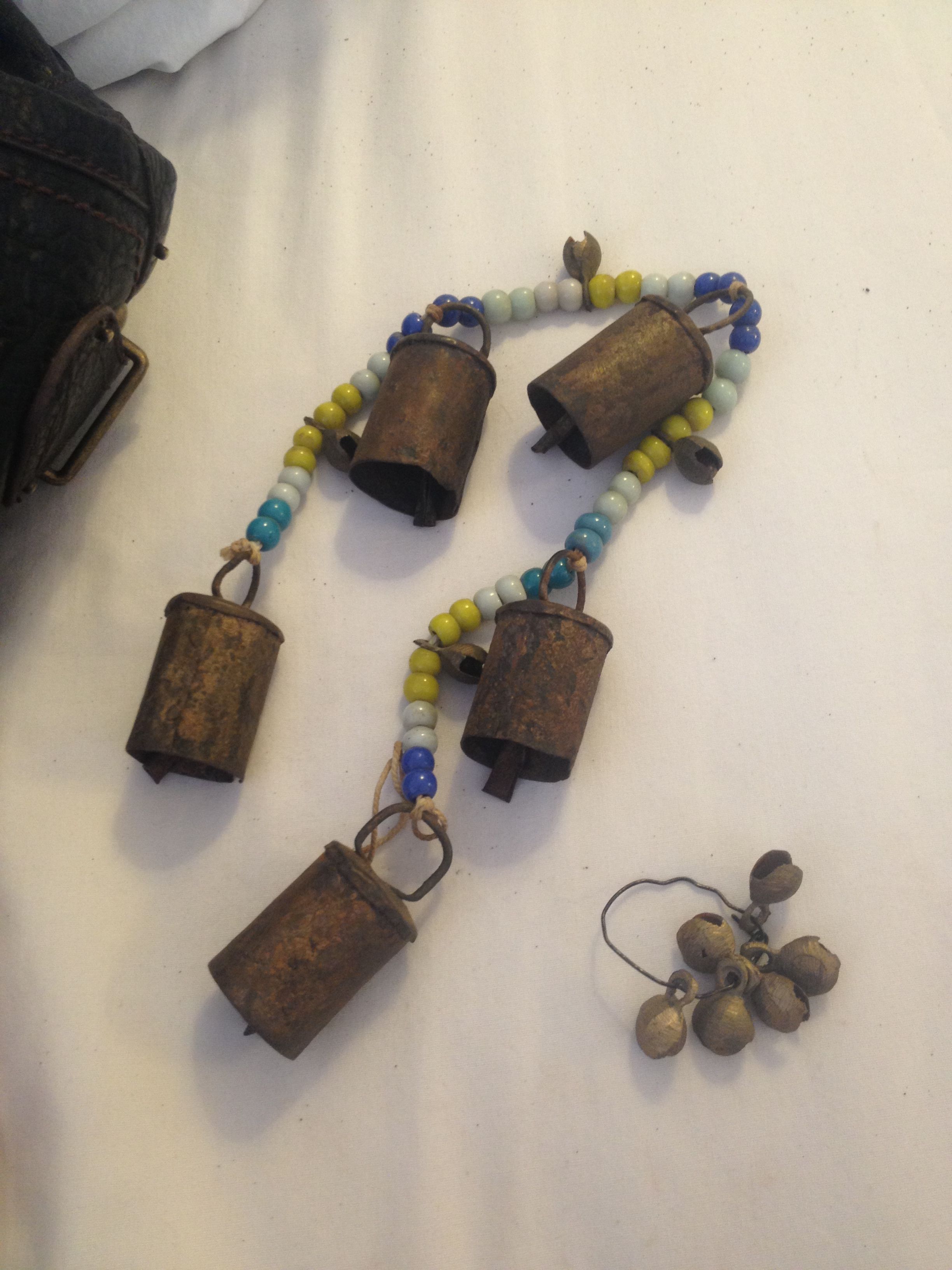 Copper/Bronze primitive bells & glass trade beads presumably Chinese in origin