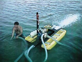 Dale using my 3" dredge in shallow water.