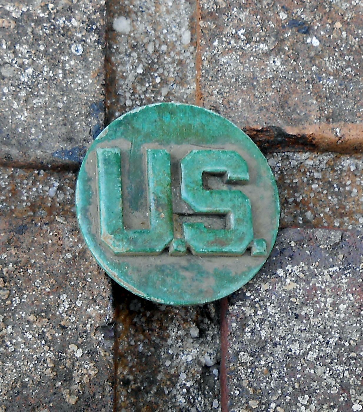 Dug this U.S. brass collar disk in Oct. 2015 used from 1937-45 in an area where army maneuvers were conducted in middle Tennessee during WW2.