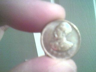 ethiopian    coin   with  haille  sallasie  on it.    bob marleys   guru