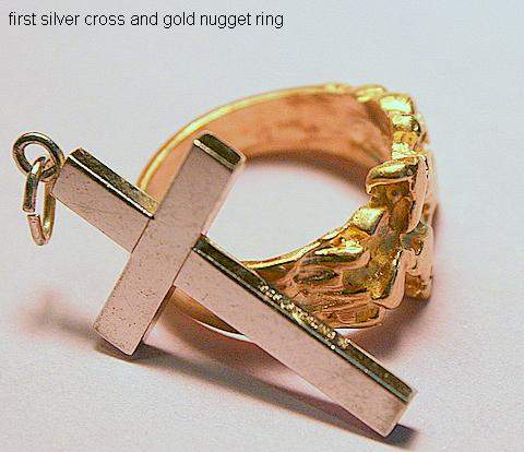 First silver cross & a nugget ring