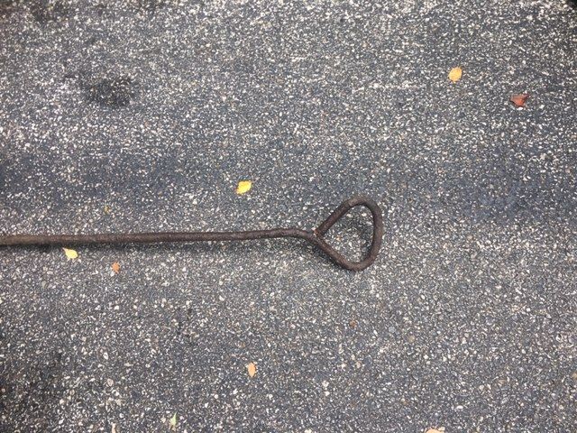 Found near the railroad... furnace stoker? Handle end.