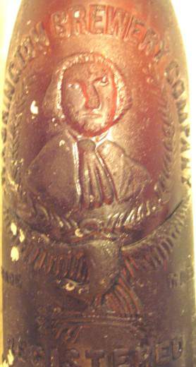 George Washington Bottle - This bottle is from the George Washington Brewery Company. It has a picture of George with an Eagle under him.