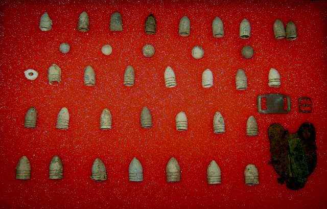 Hartsville Bullets and Lock -        These are bullets from the battle lines from Hartsville and a lock found found at a picket post. The key cover on