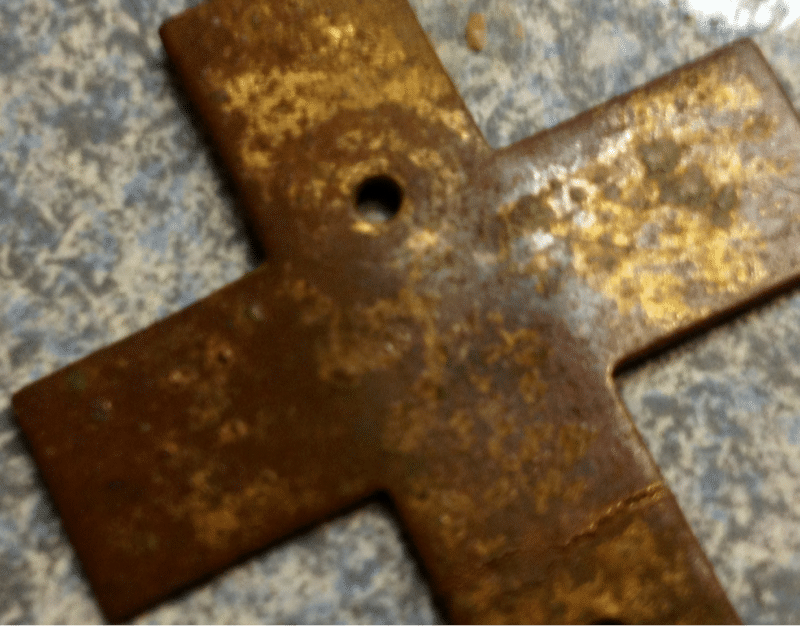 I believe this is a neck cross from the Cherokee Female Seminary...plated...copper or brass...not visible...but looks to have tiny script in the finis