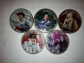 I wonder what happened to the other 45 coins in this collection......Elvis has left the building.