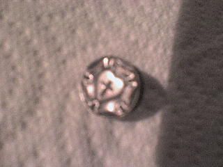 interesting silver pin