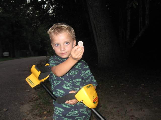 Little Dude - My little guy and his first coin. (A quarter) Proud Pops -