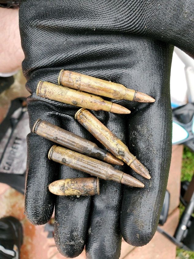 LIVE AMMO FOUND ON 10/8 ON CAPE COD IN THE WATER AND TURNED OVER TO POLICE - THE DAY BEFORE I RECOVERED OVER TWICE AS MUCH AMMO AND 3 - 50 ROUND MAGAZ