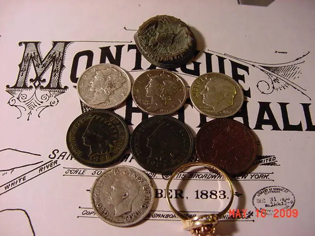 More finds added from the parsonage. Another Merc, a Canadian silver dime, a smooshed NY coat button. The rest of the coins and the ring were in the p