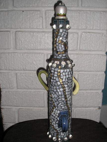 Mosaic work - I upcycle my shard finds and create mosaic pieces for the home and garden.

www.soulshards.etsy.com